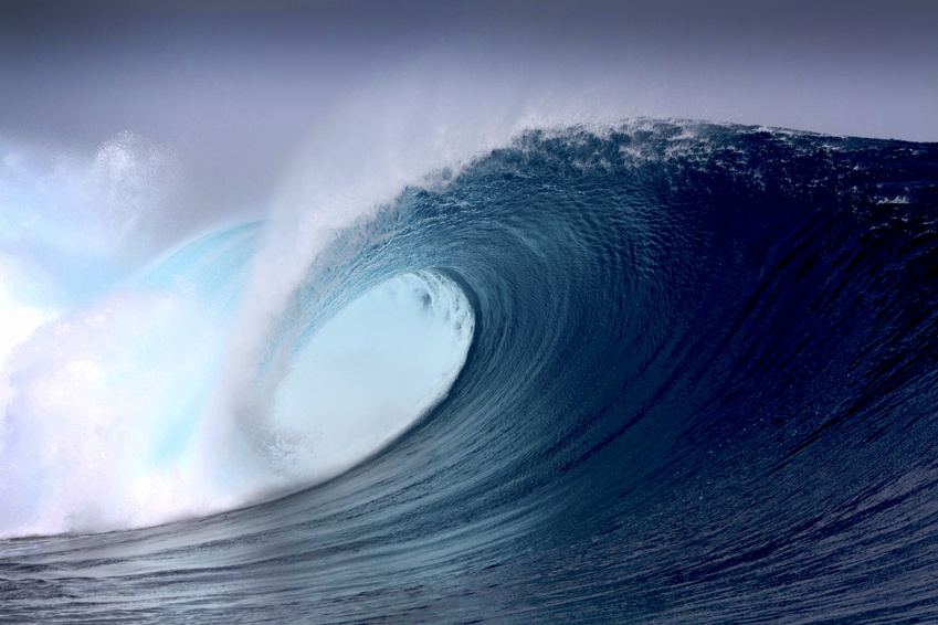 Tropical blue surfing wave